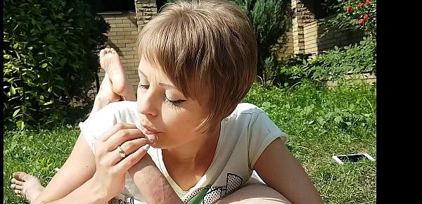  Pretty milf sucks him off with showing her little sexy soles in the yard